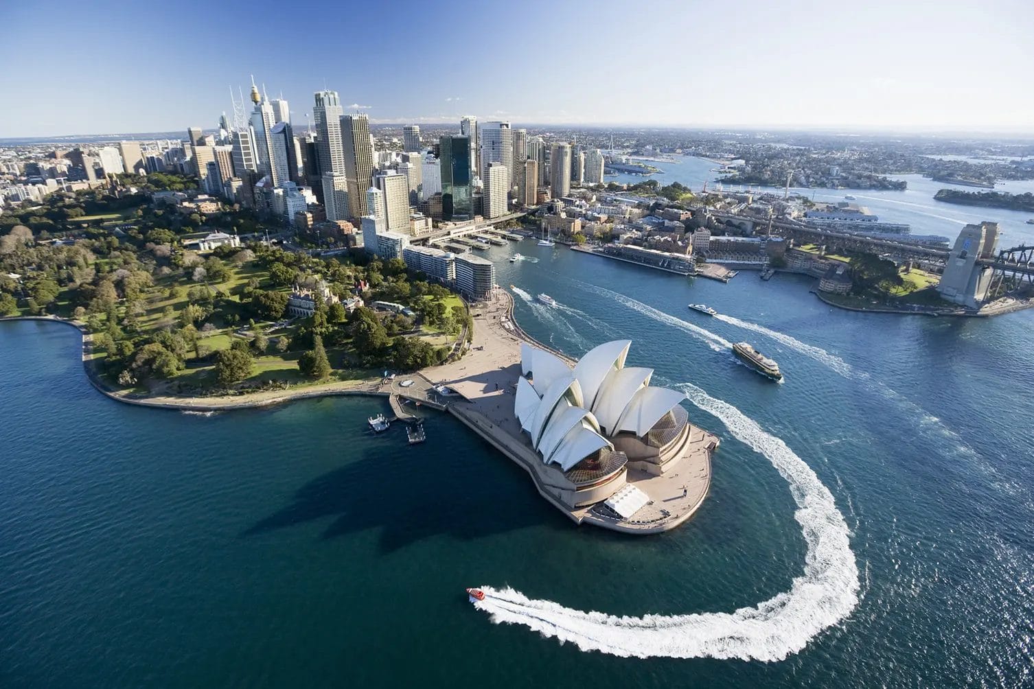 Aerial shot of Sydney overlooking the Opera House