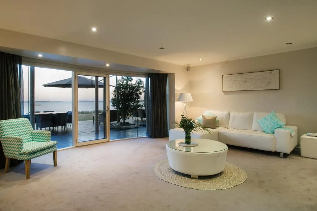 Main living room of South Point Beach House on the Eyre Peninsula, overlooking Boston Bay and a small grassy area