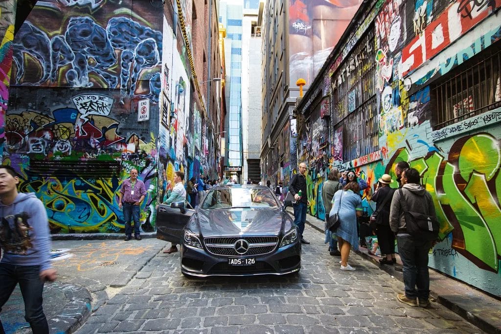 Mercedes vehicle parked in Hosier Lane in Melbourne, a renowned spot for street art