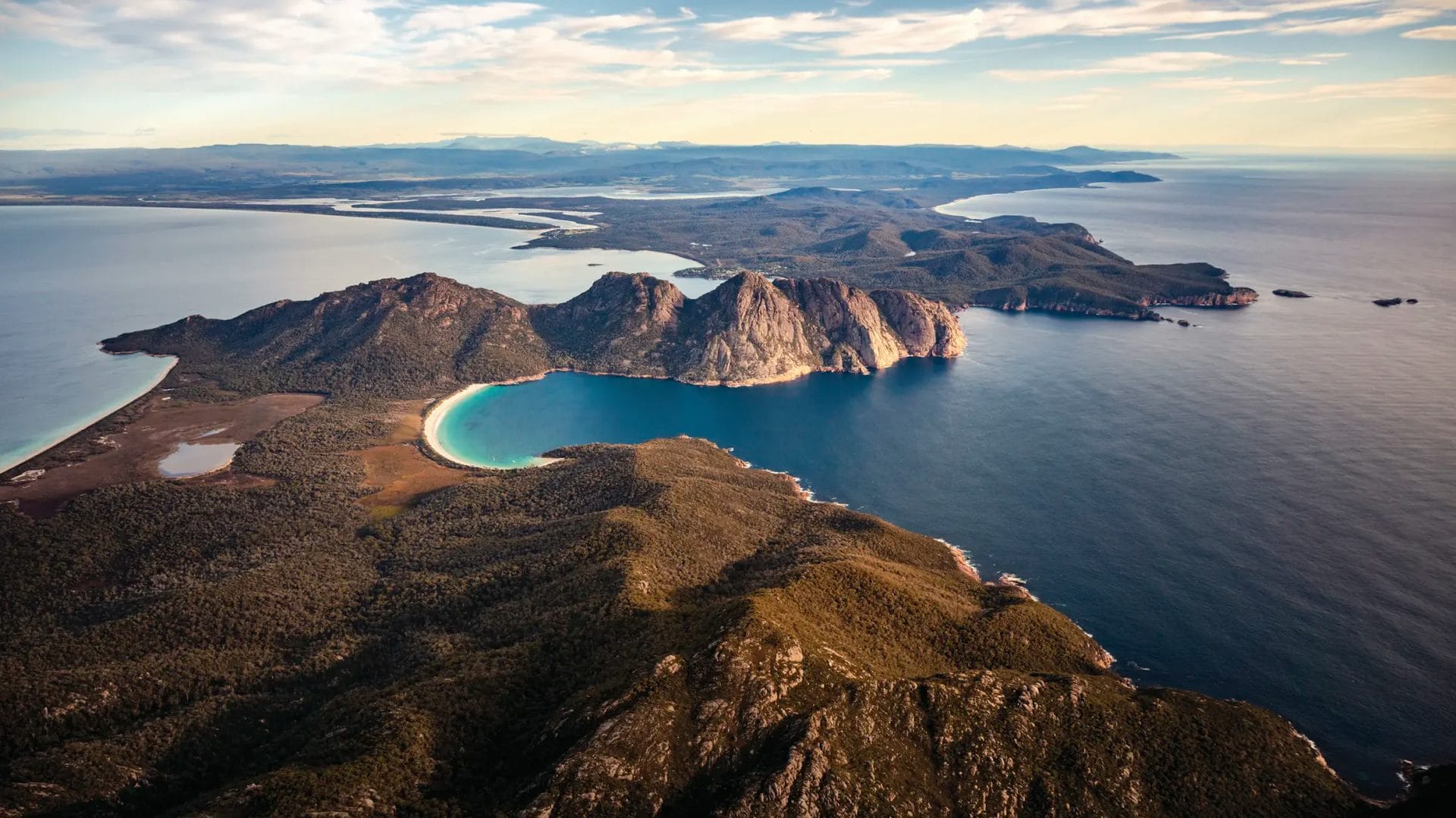 Sweeping aerial of Wineglass Bay on the Freycinet Peninsula on Tasmania’s East Coast